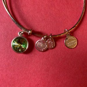 Two Alex and Ani bracelets. (+)Energy August peridot, Path of Life.